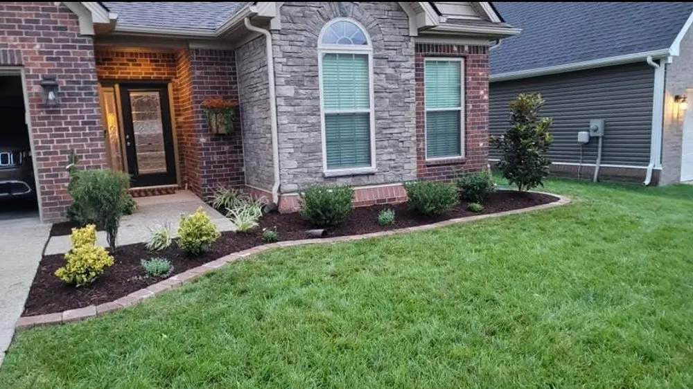 Custom residential landscaping with custom design across Louisville, KY - Harris Lawn And Landscape