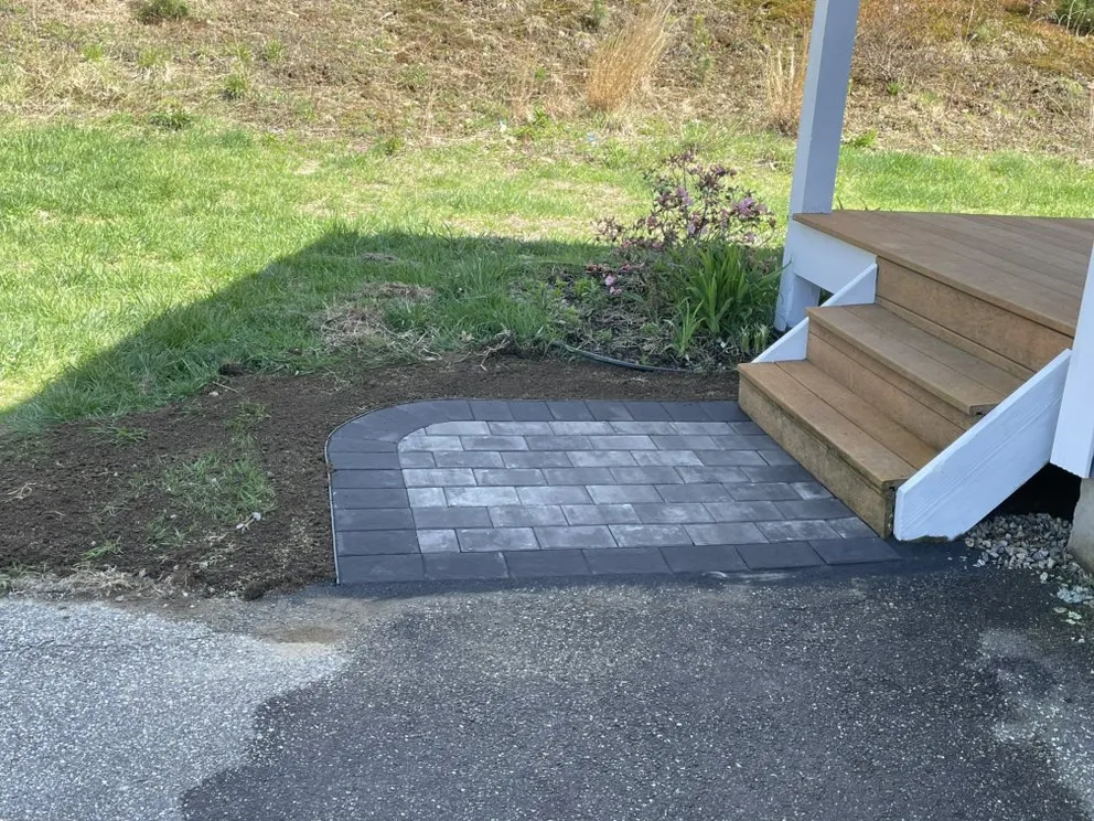 Local yard cleanup service for year-round maintenance in Charlton, MA by Hartland