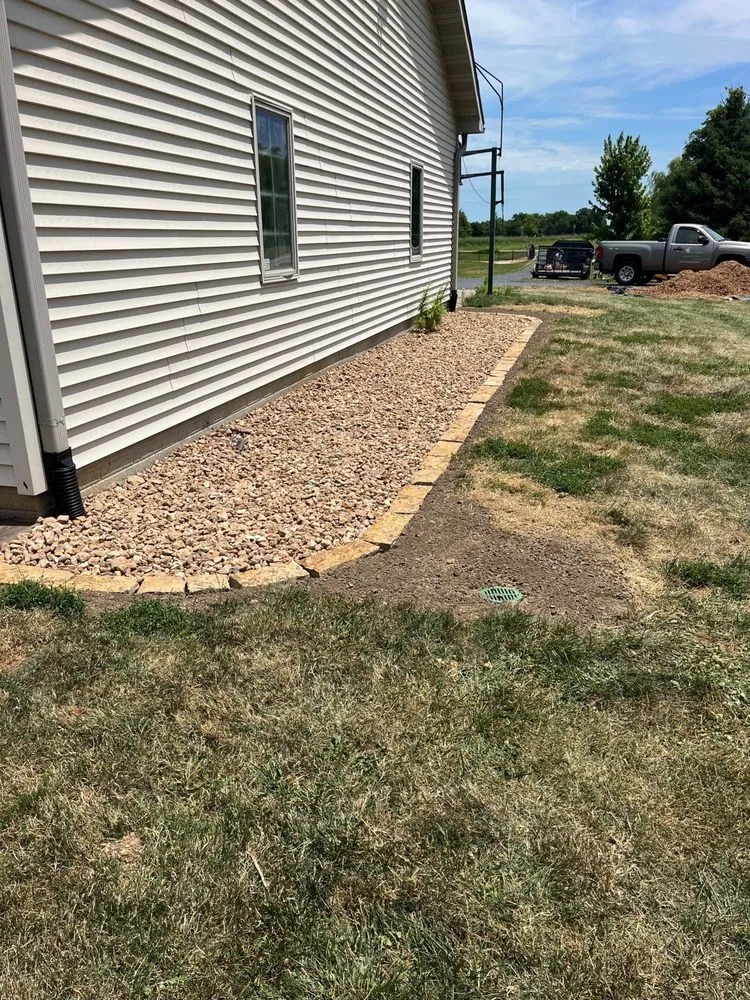 Custom yard cleanup service for homes in Athens, IL by Hartman Landscaping & Lawncare