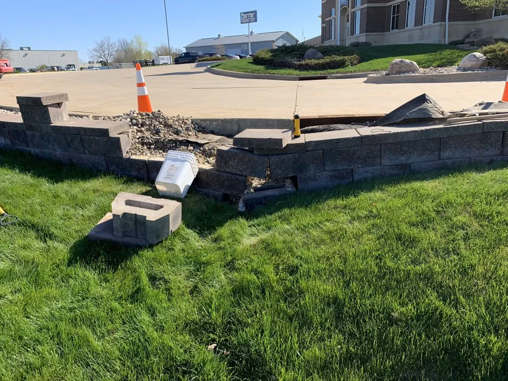 Professional landscape installation for residential properties in Waverly, IA by Hartman Services