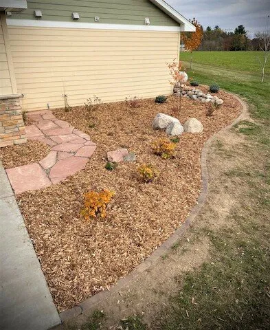Custom yard cleanup service for beautiful yards in Glenwood City, WI by Harvest Hill Landscape
