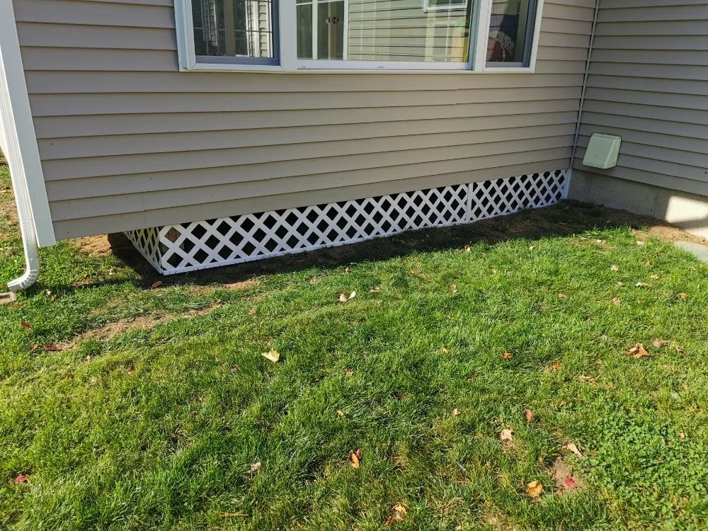 Custom yard cleanup service in Manchester, CT by Harvest Landscaping