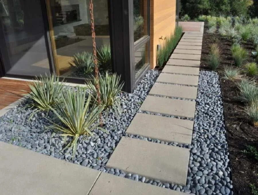 Local lawn mowing service with custom design in Denver, CO by Harvester Landscapes