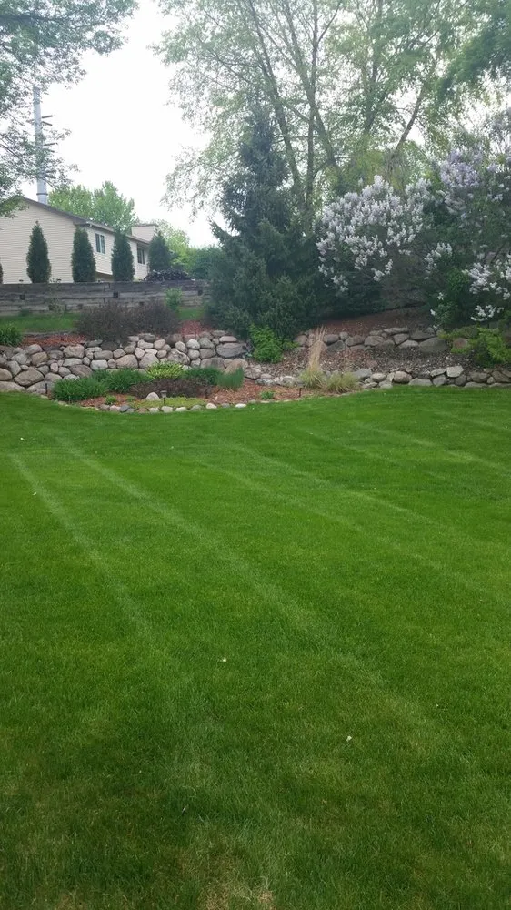 Expert lawn care service for homes in Plymouth, MN by HASSLE FREE Lawns