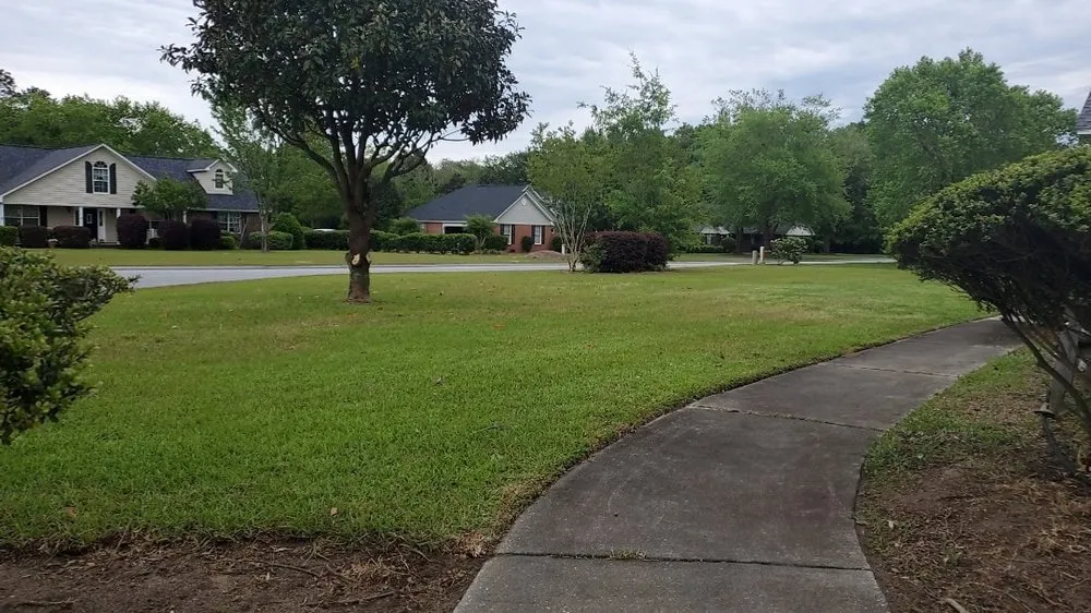 Expert outdoor landscaping with custom design in Sumter, SC by Hat Trick Property Management