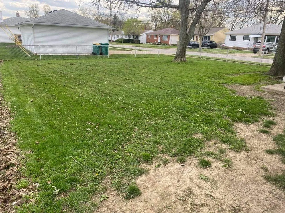 Professional lawn mowing service for homes in Cleveland, OH by Hatfields Lawn Care