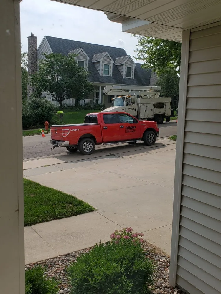 Professional lawn mowing service for outdoor upgrades in Rochester, MN by Hathaway Tree Service