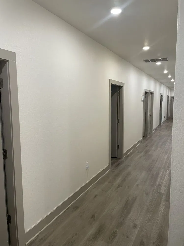 Expert lawn mowing service for residential properties in Justin, TX by Hatley Dream Builders