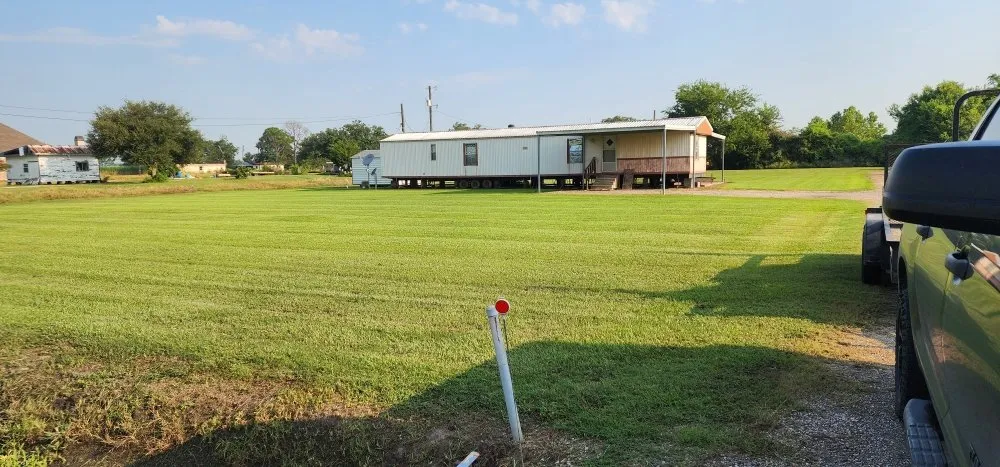 Custom residential landscaping for homes in Saint Martinville, LA by Hauling Grass Outdoor Services