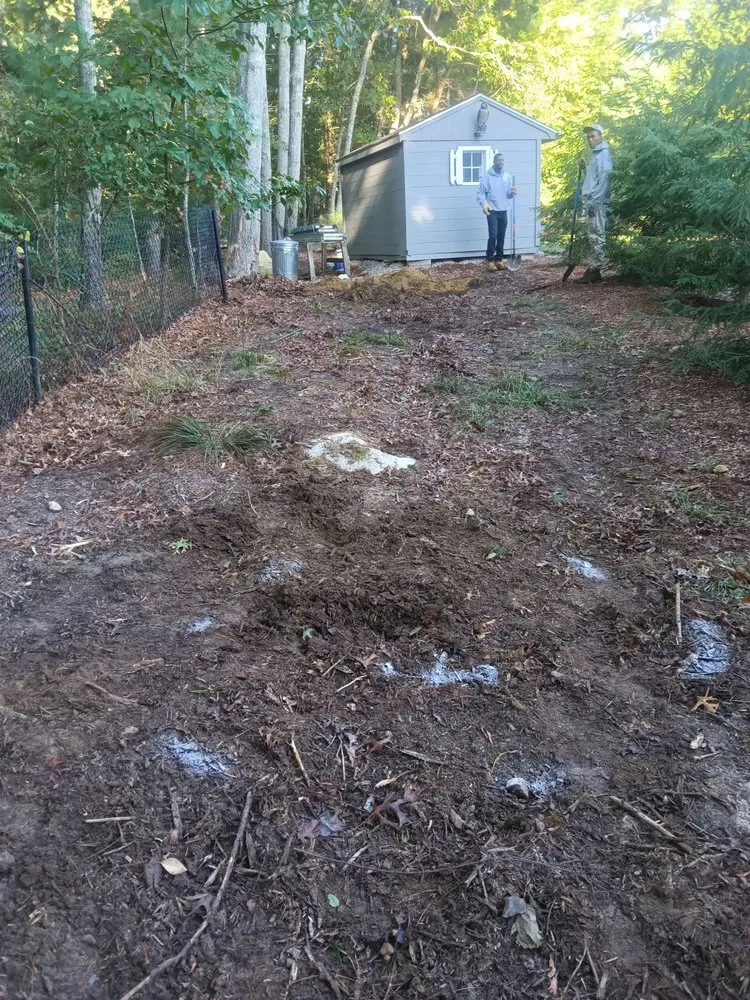 Custom yard cleanup service for residential properties across Marshfield, MA - Hawk Landscape