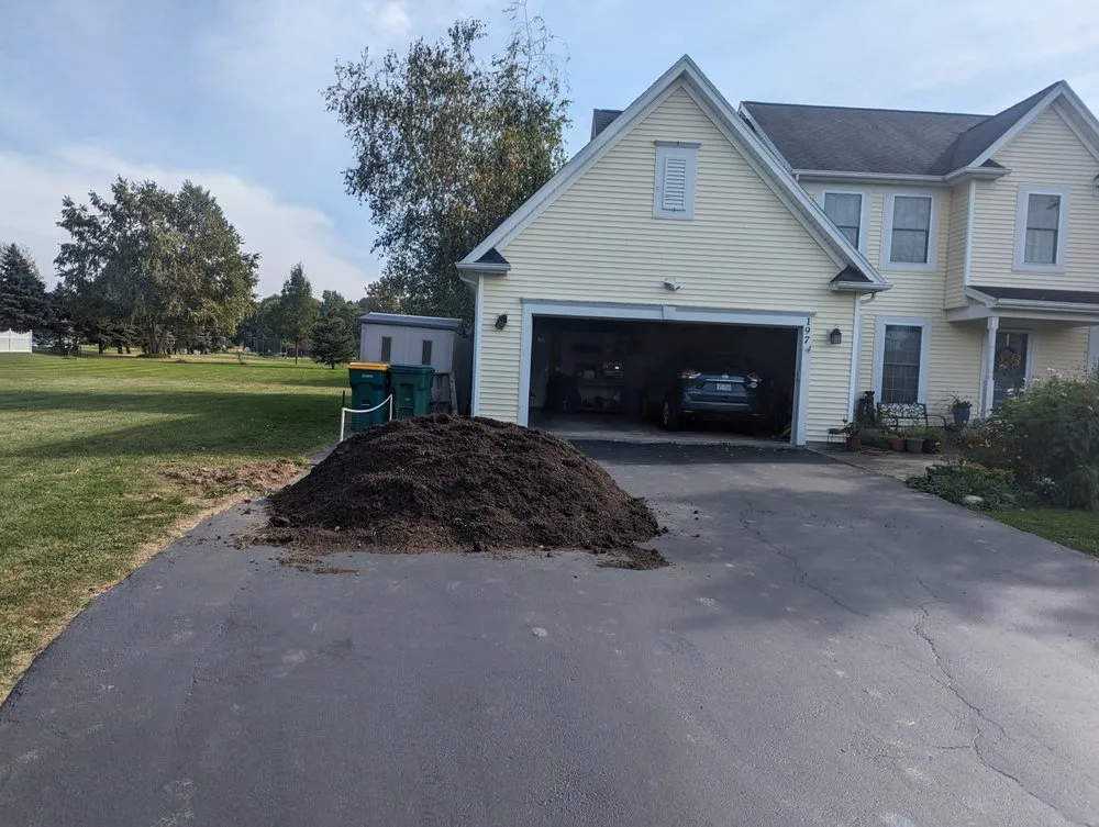 Professional yard maintenance for homes in Ontario, NY by Hawkes Landscaping