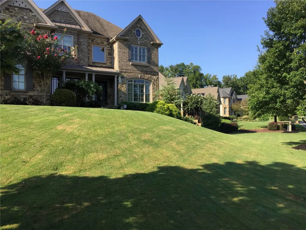 Top-rated lawn care service for residential properties across Woodstock, GA - Hawks Landscaping