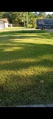 Hawk's Lawn Service Care Logo