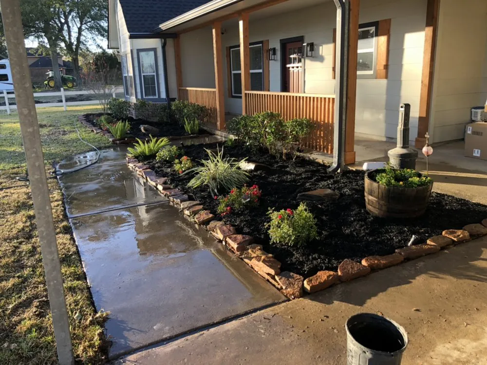 Custom yard maintenance with custom design in Katy, TX by Hayes Landscape and Exterior Services