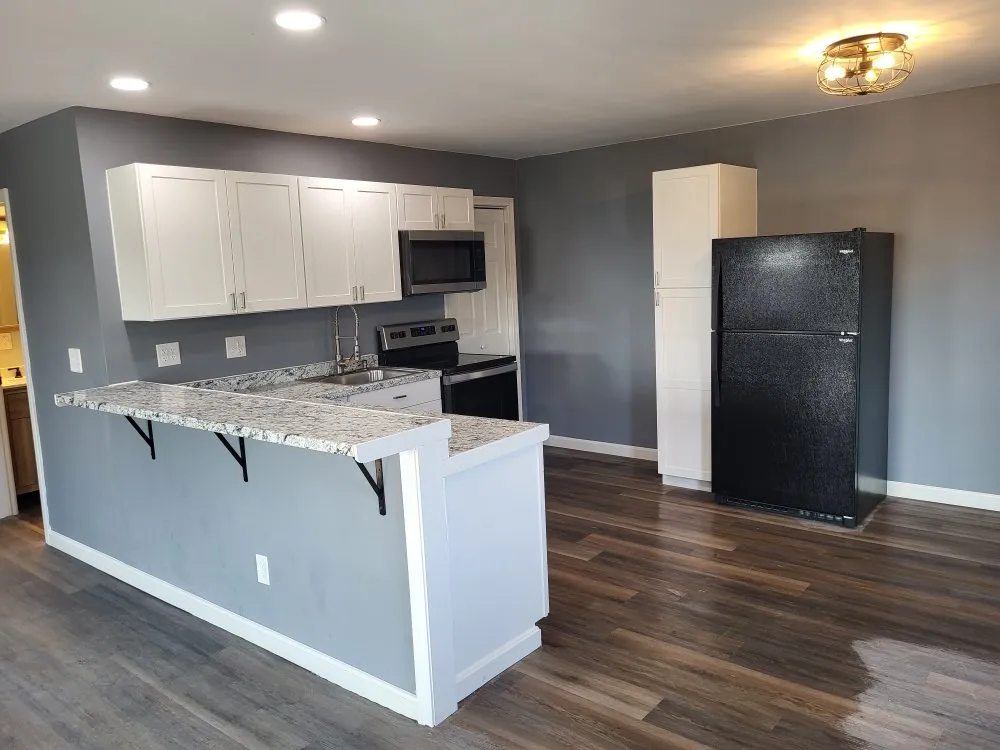 Custom landscape installation in Winterport, ME by HBH Builders