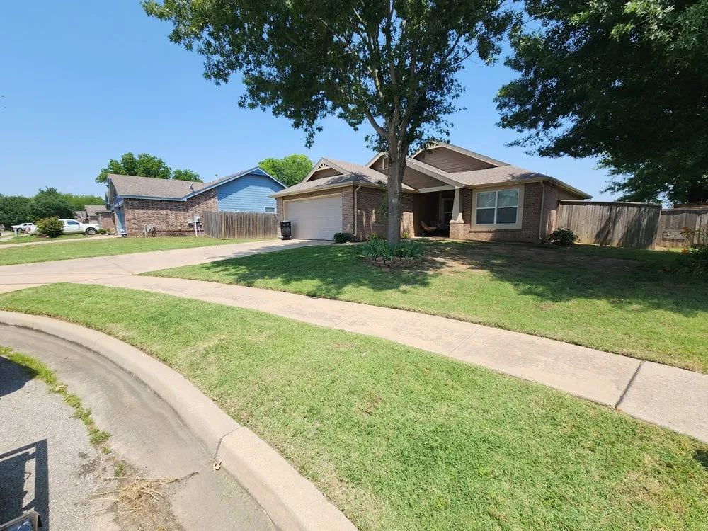 Local landscape installation for year-round maintenance in Okmulgee, OK by HD Lawns and Gardens