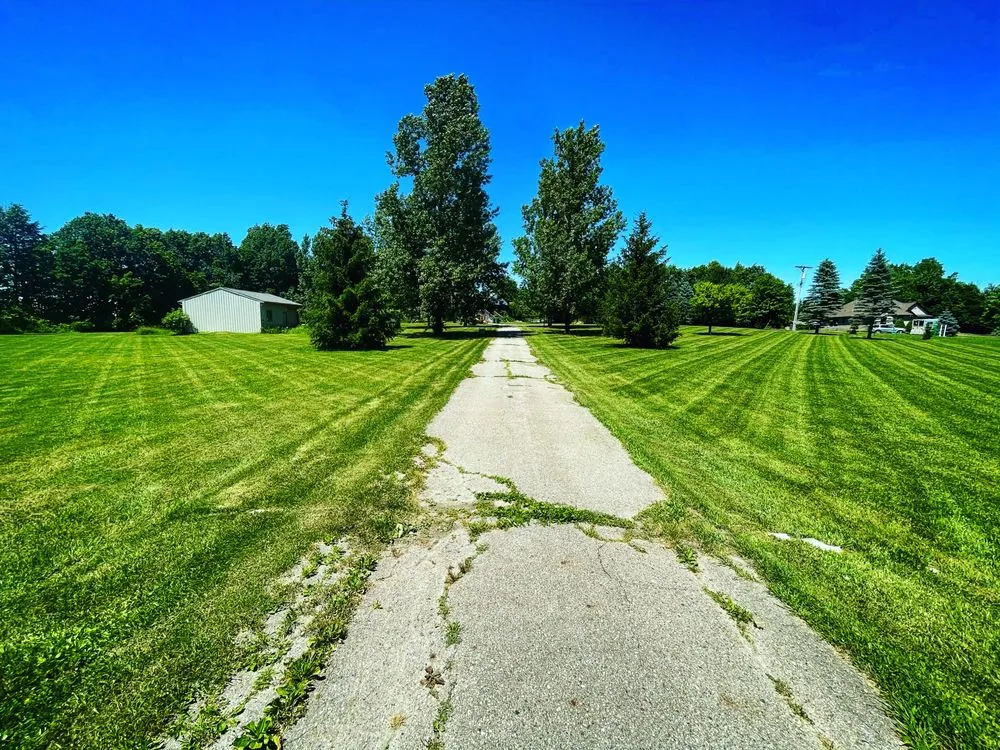 Custom lawn mowing service for homes across Emmett, MI - Heacock's Property Maintenance