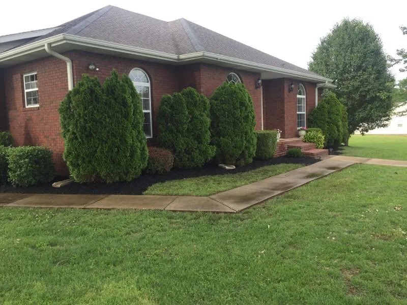 Custom garden landscaping for beautiful yards in Bernie, MO by Heartland Lawn Service