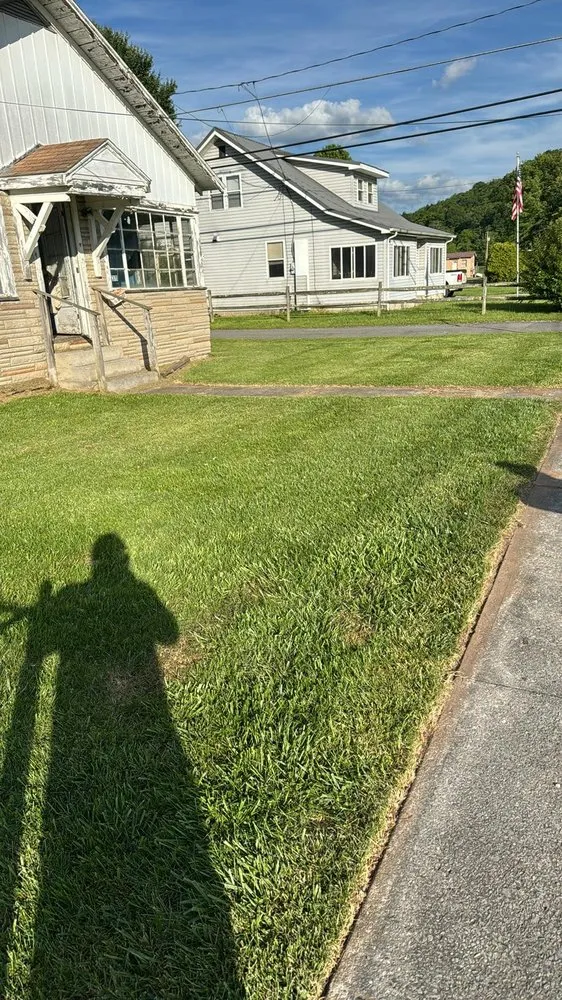 Affordable lawn mowing service in Rainelle, WV by Heathen Lawn Care