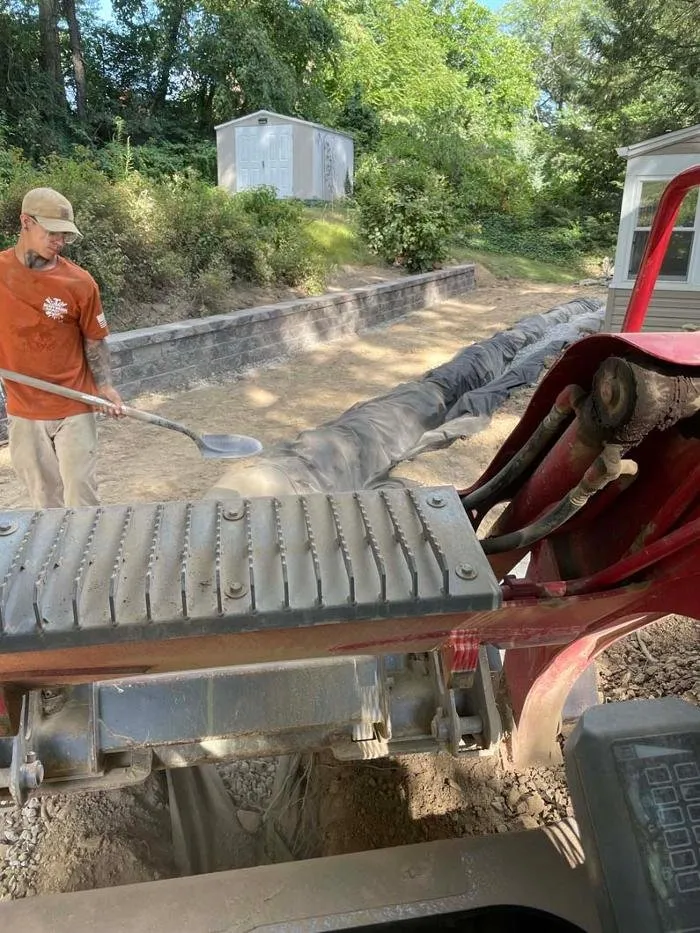 Professional lawn mowing service for homes in Donora, PA by Heavy Weight Builders