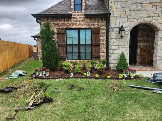 Hector's Lawn Landscaping & Construction Logo