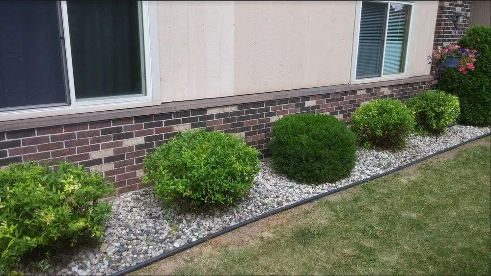 Trusted lawn mowing service for beautiful yards across Oshkosh, WI - HedgeHog Yard & Garden Services