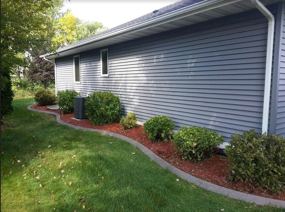 Affordable yard cleanup service near you across Oshkosh, WI - HedgeHog Yard & Garden Services