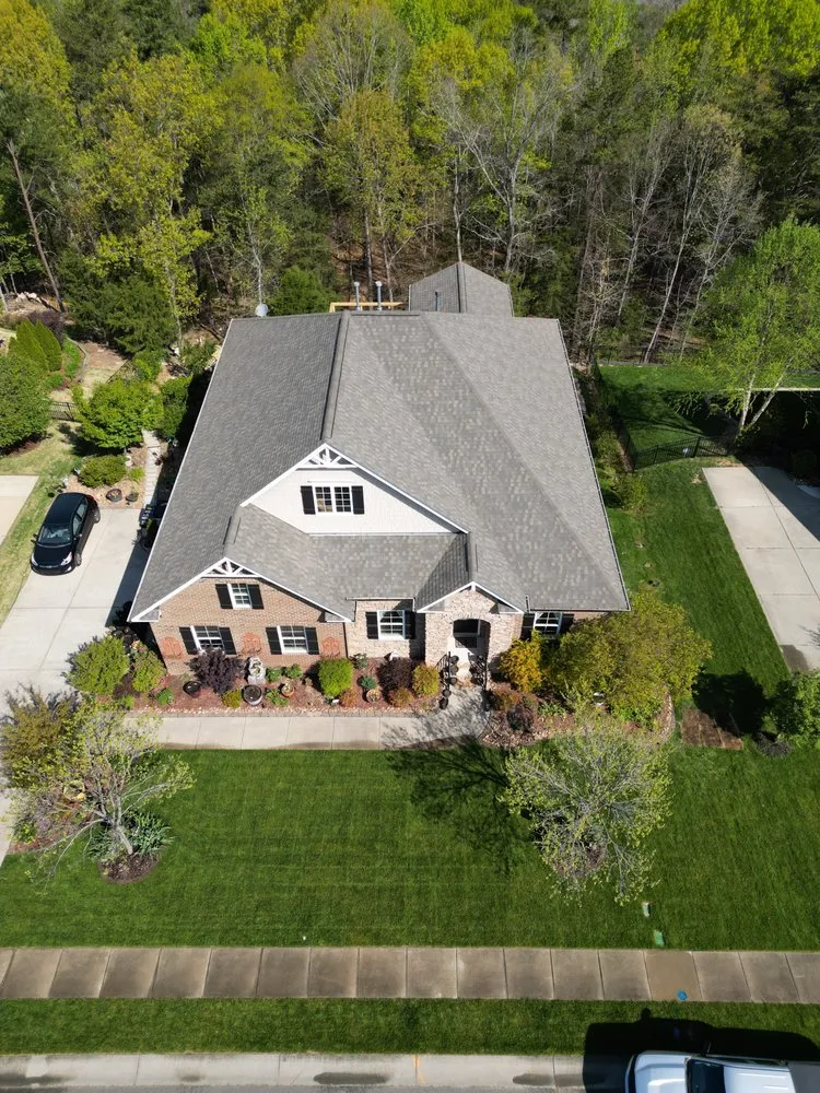 Affordable lawn mowing service with custom design in Fort Mill, SC by Hedgepeths Outdoor Services