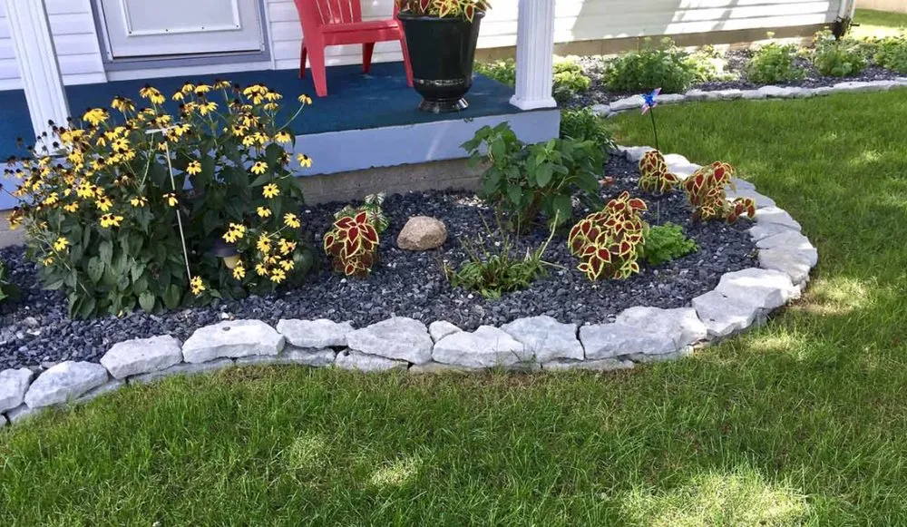 Custom garden landscaping for outdoor upgrades in Oak Harbor, OH by Heggies Lawn Care