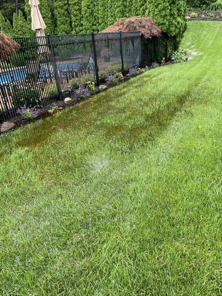 Reliable lawn mowing service in Middle Island, NY by Heidrich Landscaping