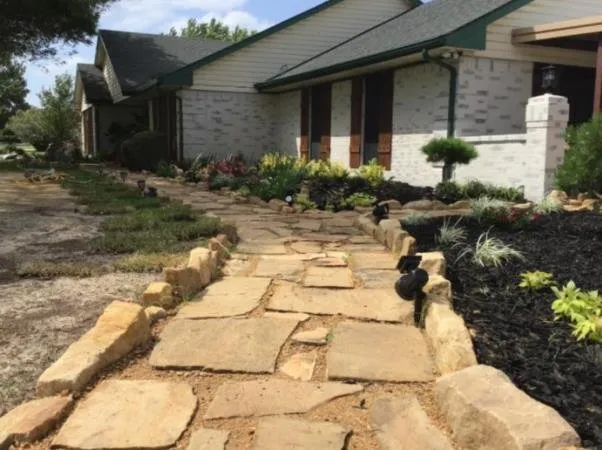 Reliable lawn mowing service for year-round maintenance in Forney, TX by Helms Trail Tree Trimming and Property Management