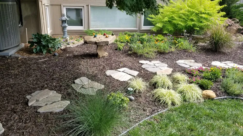 Top-rated landscape installation for residential properties in Olathe, KS by Help From A Friend