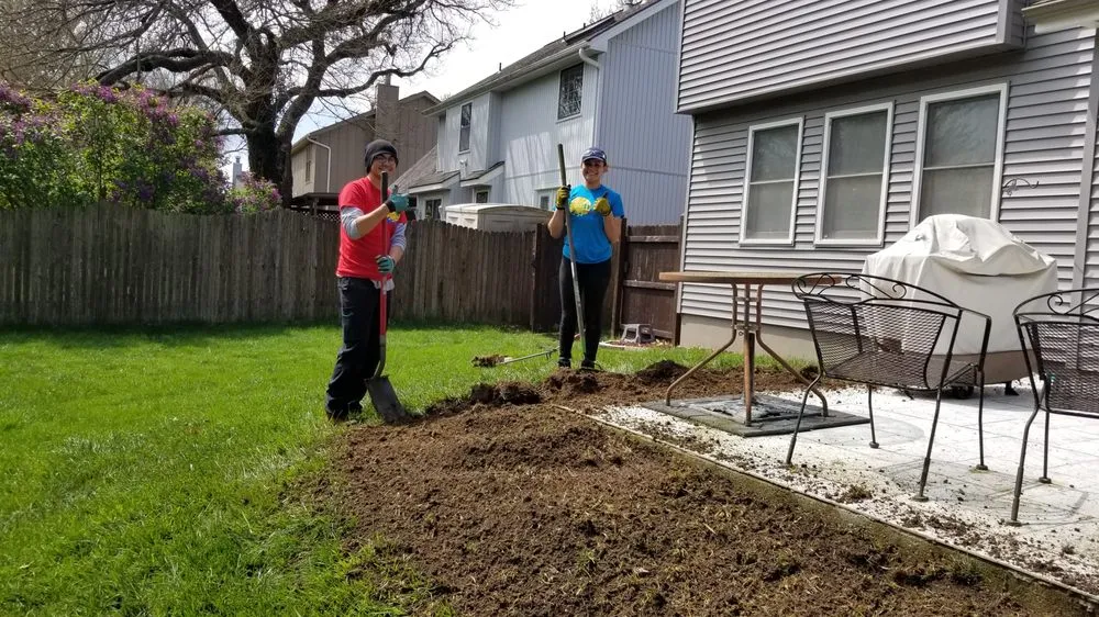 Professional residential landscaping in Olathe, KS by Help From A Friend