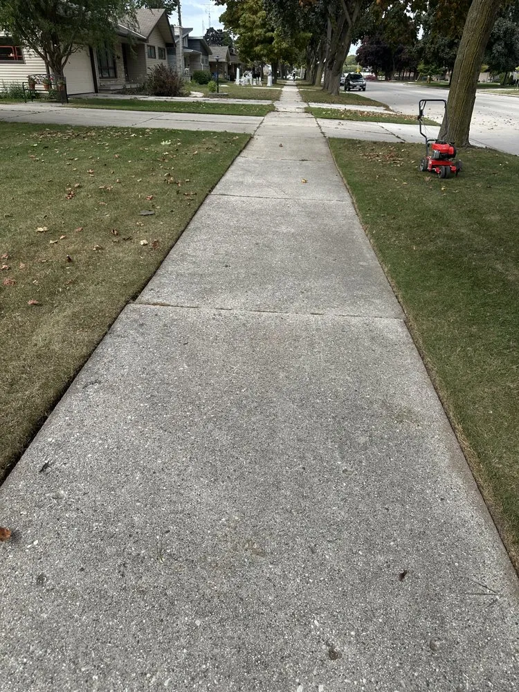 Custom yard cleanup service near you in Manitowoc, WI by Helper Hansen