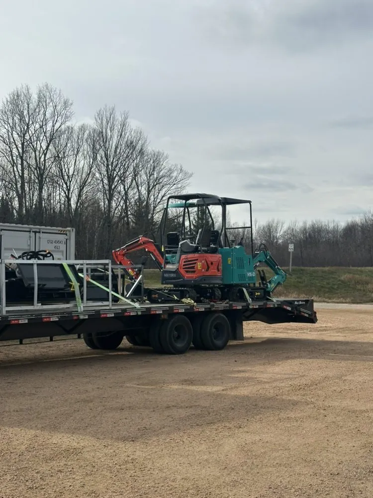 Local garden landscaping with custom design in Manitowoc, WI by Helper Hansen