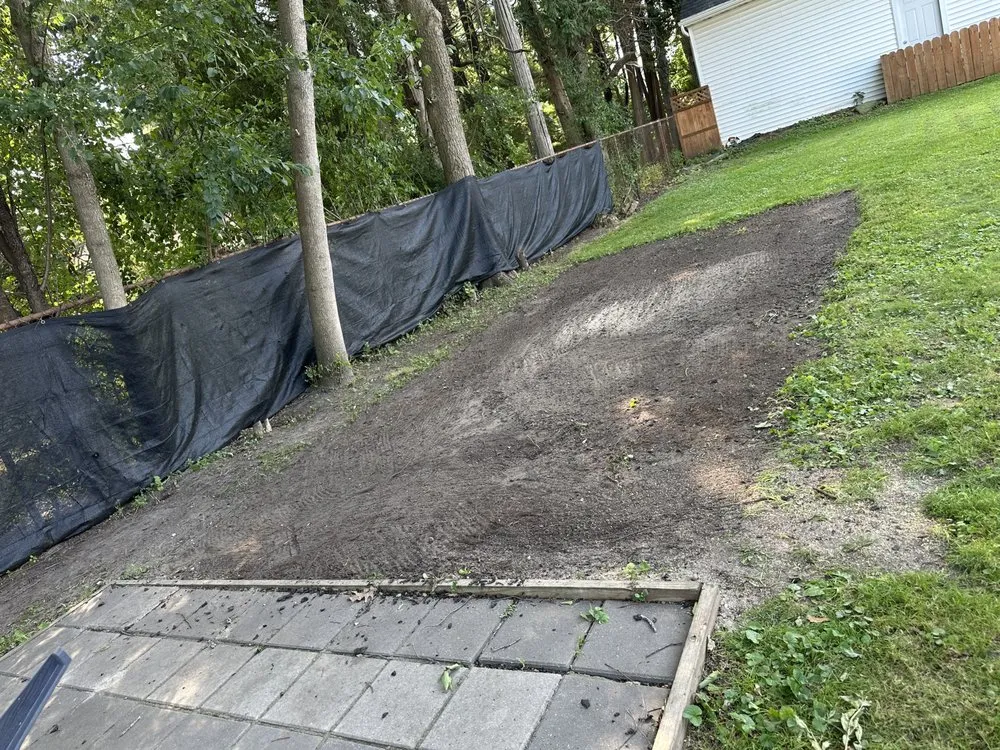 Professional yard maintenance with custom design across Manitowoc, WI - Helper Hansen