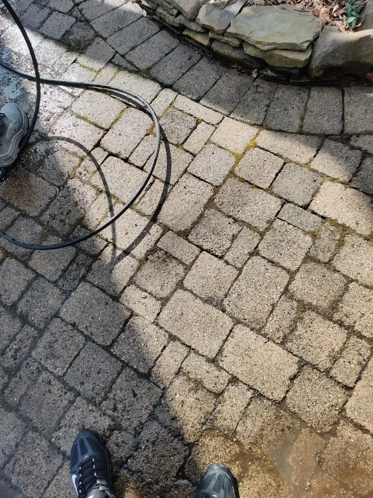 Custom yard maintenance for residential properties in Buffalo, NY by Helping Hand affordable services