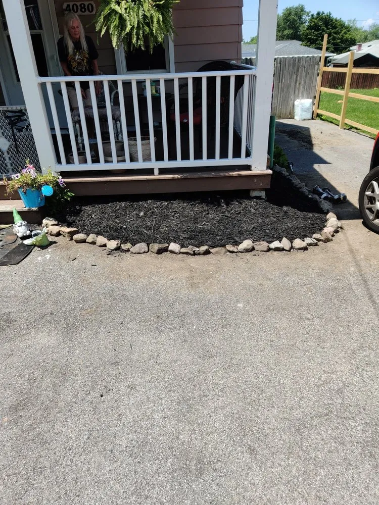 Reliable lawn mowing service for residential properties in Buffalo, NY by Helping Hand affordable services