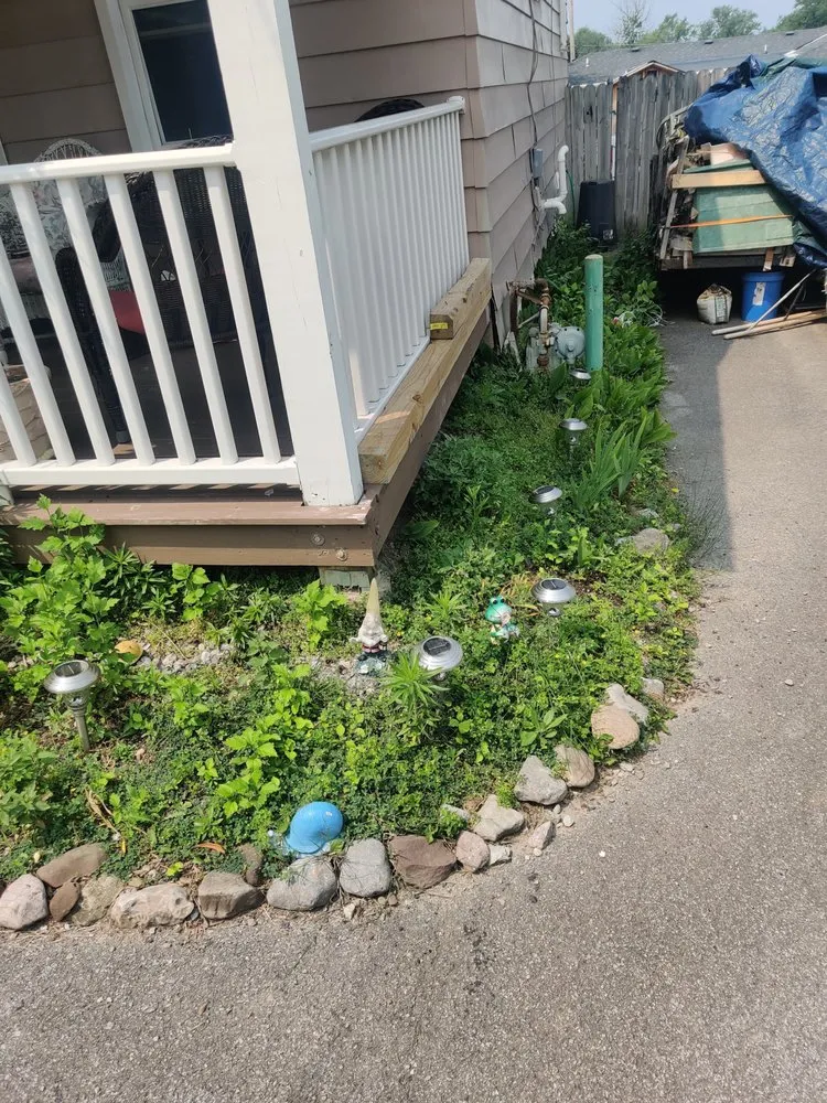 Expert outdoor landscaping for homes in Buffalo, NY by Helping Hand affordable services