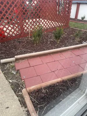 Helping Hand Lawn Care Logo