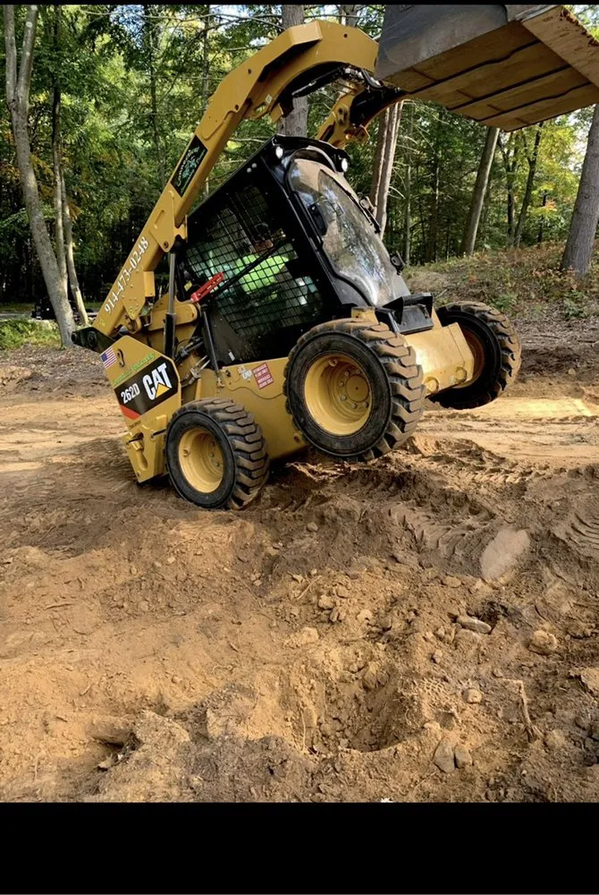 Professional lawn mowing service in Randolph, MA by Helping Hand Specialist