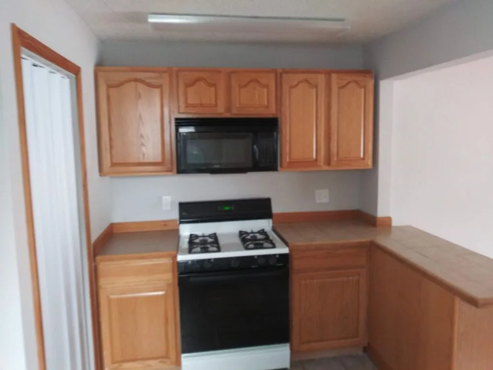 Custom yard maintenance experts serving Elyria, OH - Helping Hands All Season Services