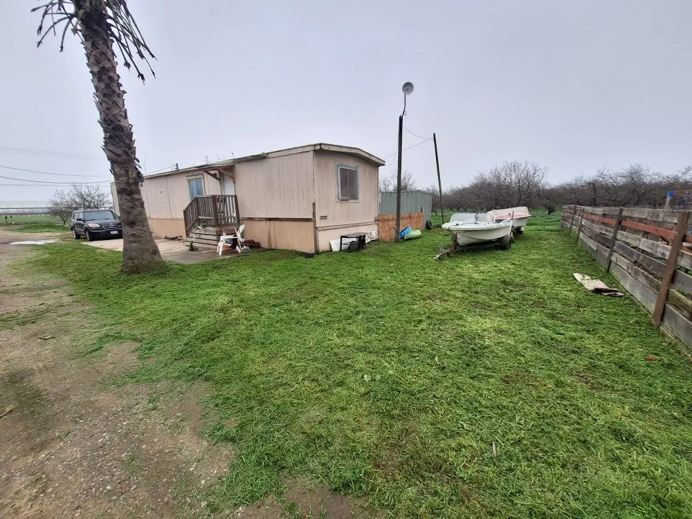 Professional outdoor landscaping experts serving Crows Landing, CA - Helping Hands