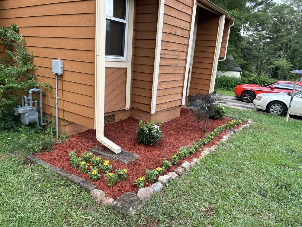 Expert landscape design with custom design in McDonough, GA by Helping Hands Landscaping