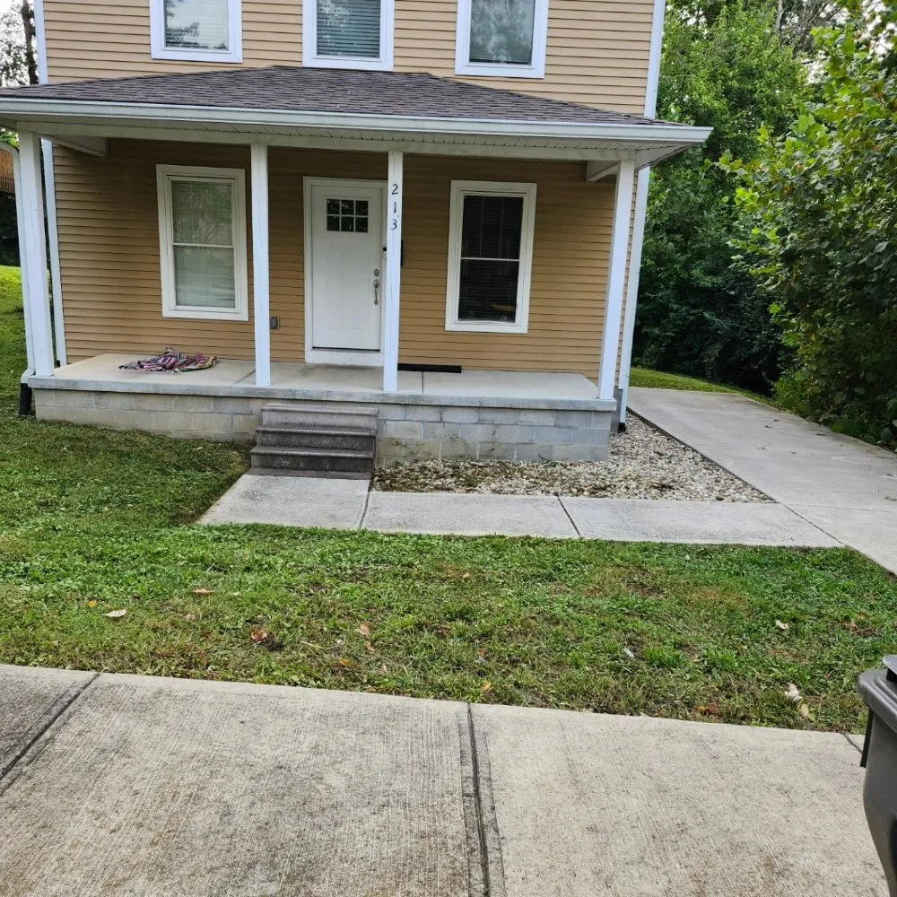 Custom landscaping services for residential properties in Solsberry, IN by Helping Hands Lawn and Landscape