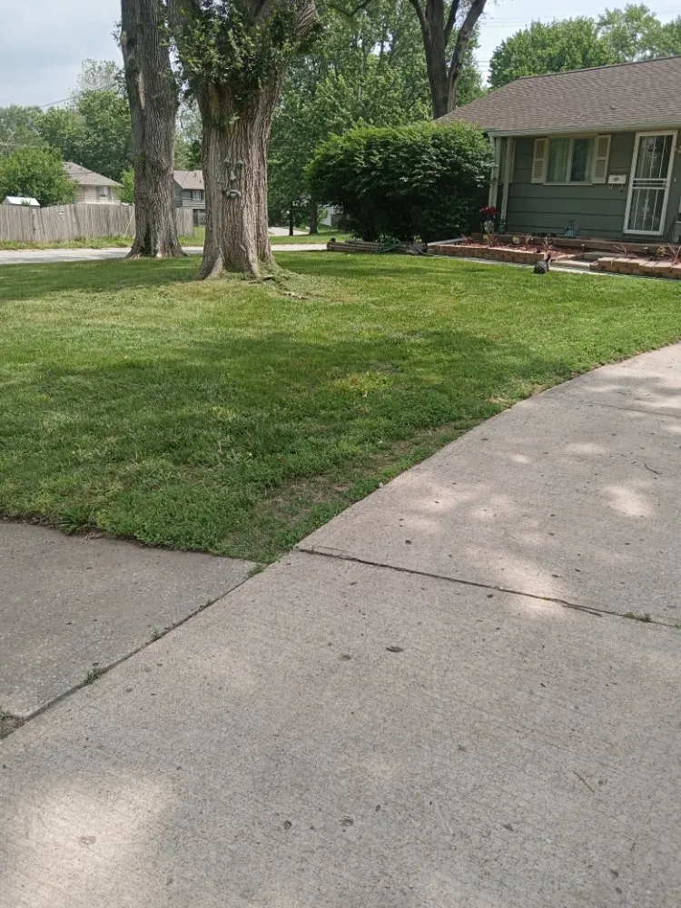 Affordable landscaping services for residential properties across KANSAS CITY, MO - Helping Hands Lawn Care