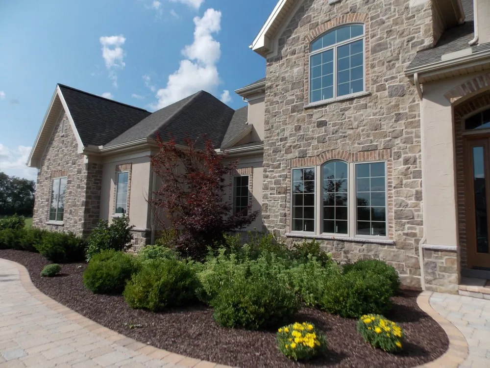 Professional yard cleanup service for year-round maintenance in Harrisburg, PA by Hemlock Landscaping