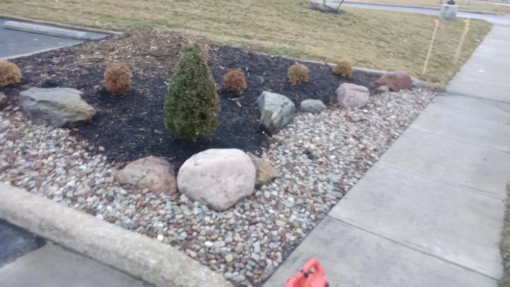 Expert outdoor landscaping for residential properties in Elyria, OH by Hendricks Mowing