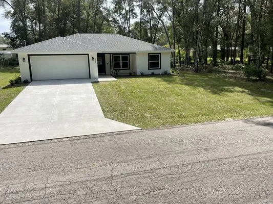 Henleys Lawn And Landscaping Logo