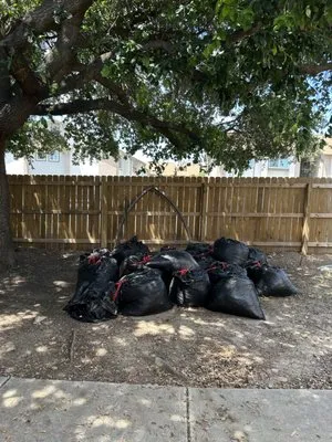 Henry and Christina's Landscaping and Handyman Services Logo